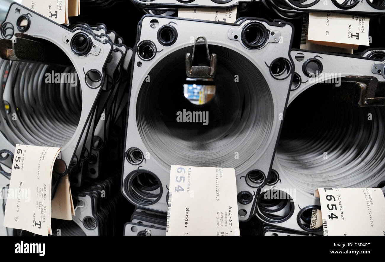 Cylinder head gasket parts are hung up at the German car spare parts
