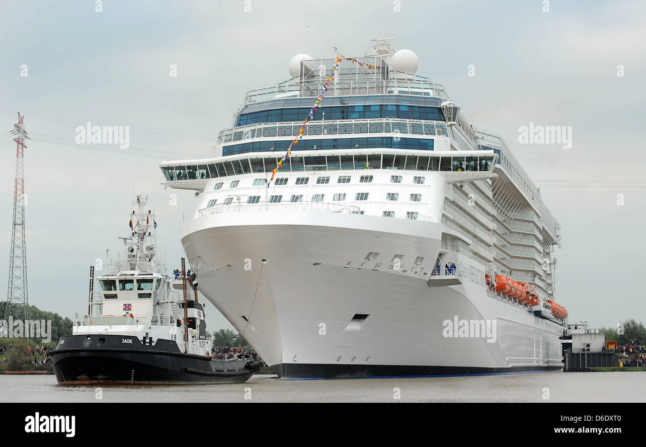 The new cruise ship 'Celebrity Reflection' leaves the fitting pier of the Meyer shipyard in Papenburg to be transferred to the North Sea, Germany, 16 September 2012. Photo: INGO WAGNER Stock Photo