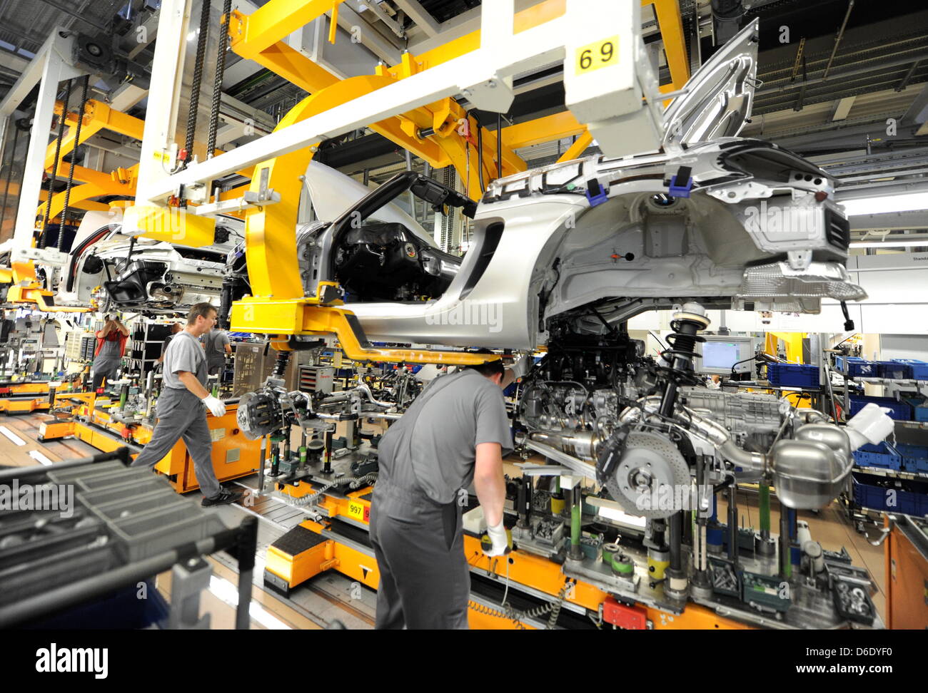 Porsche Employees Assemble Cars At The Manufacturing Plant In Stuttgart