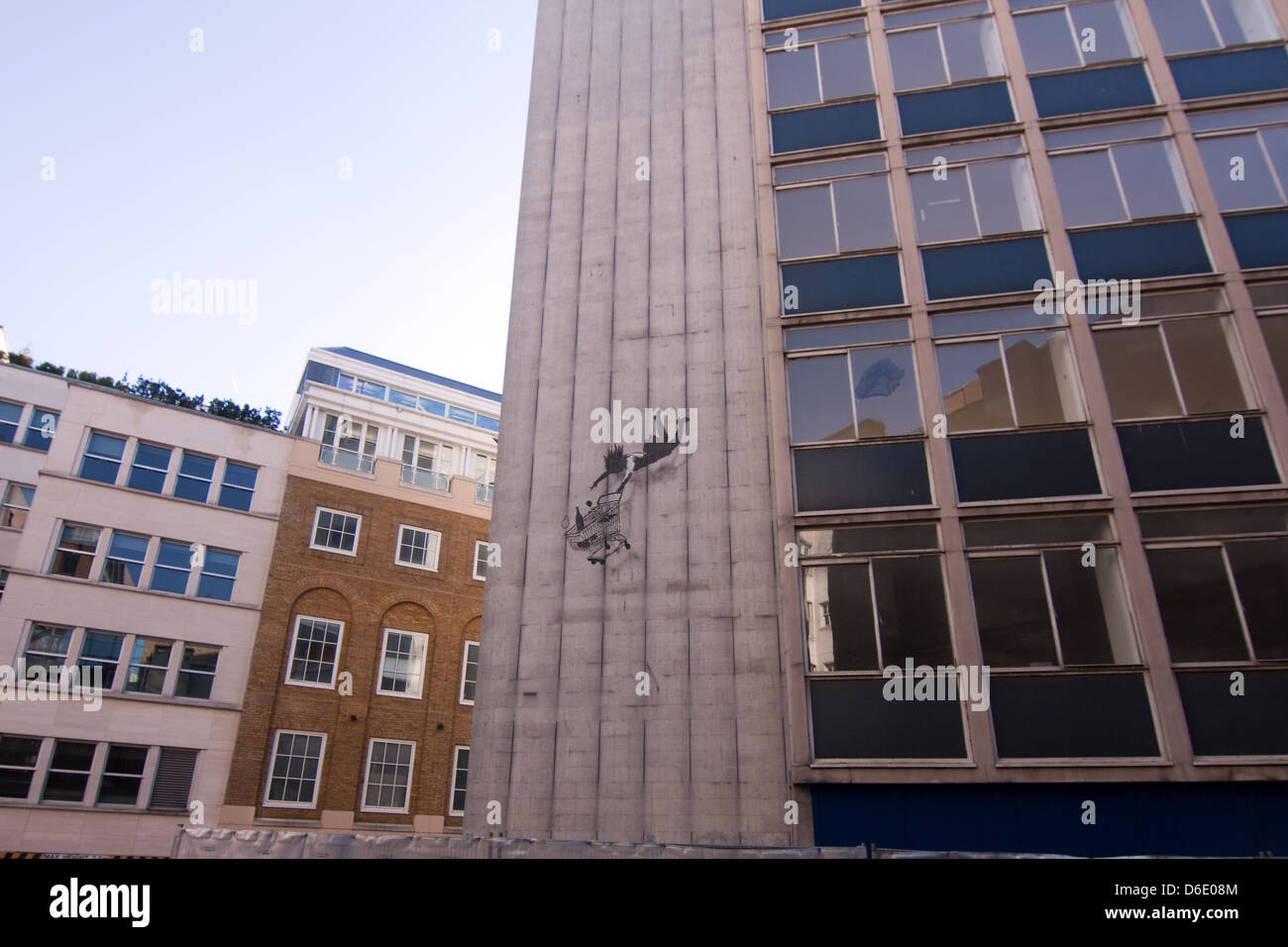 Banksy grafitti known as Shop Till You Drop in Bruton Street Central London close to Bonhams Auction House Stock Photo