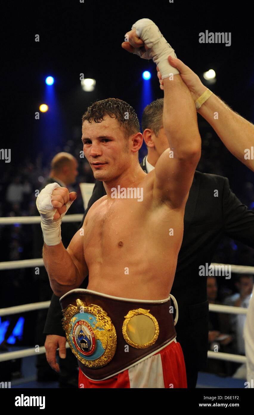 Super-middleweight boxer Robert Stieglitz from Magdeburg celebrates his  victory against Henry Weber from Stralsund in the WBO World Championship  fight at the Baden Arena in Offenburg, Germany, 14 January 2012. Photo:  Patrick