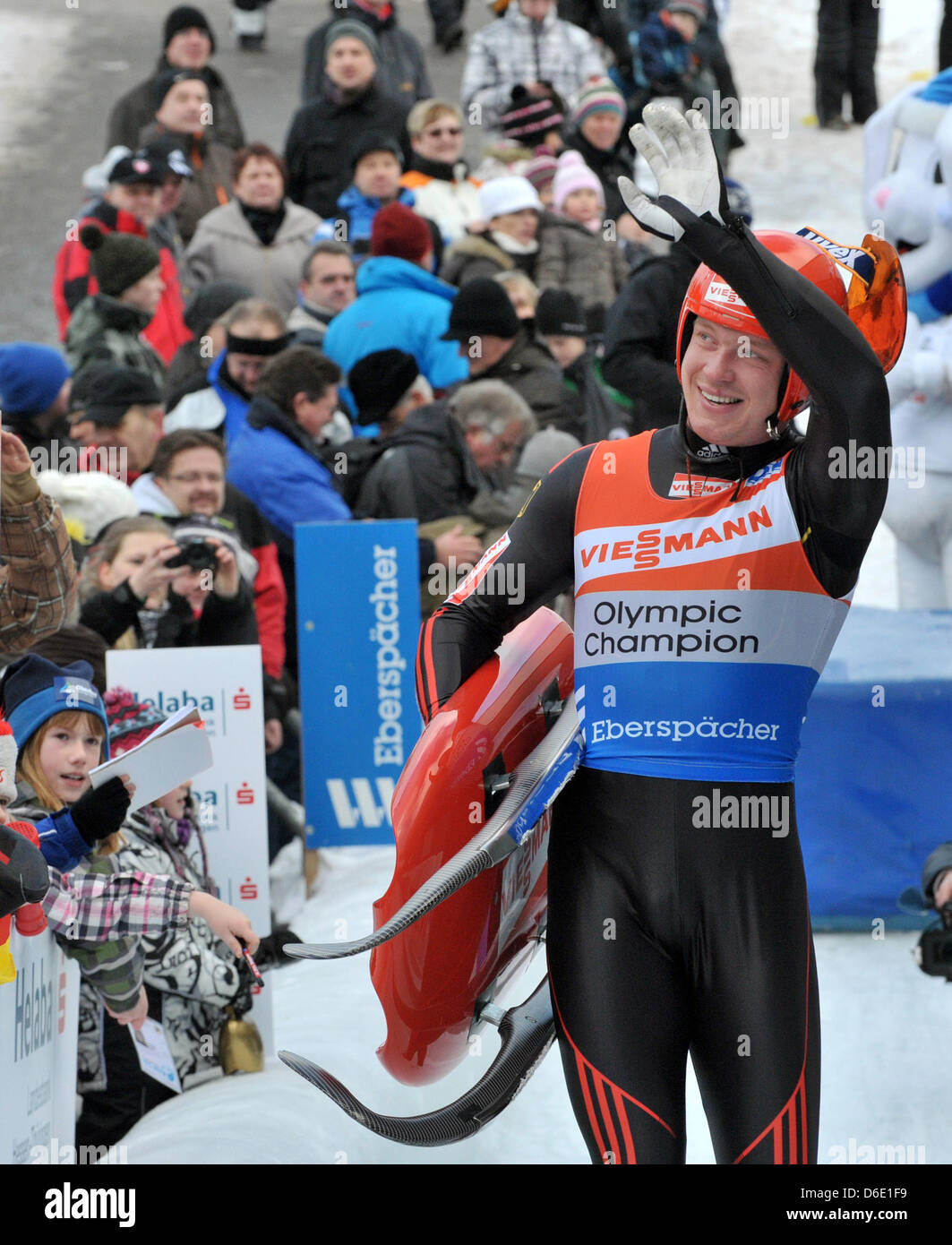 German luger Felix Loch celebrates his first place in the men's single 