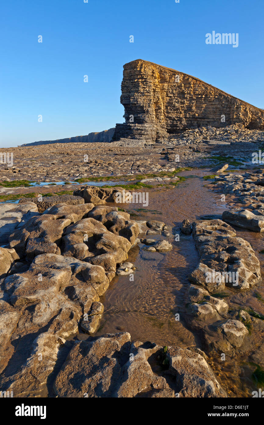 The limestone cliffs at Nash Point in South Wales, taken just after sunrise on a clear sunny day. Stock Photo