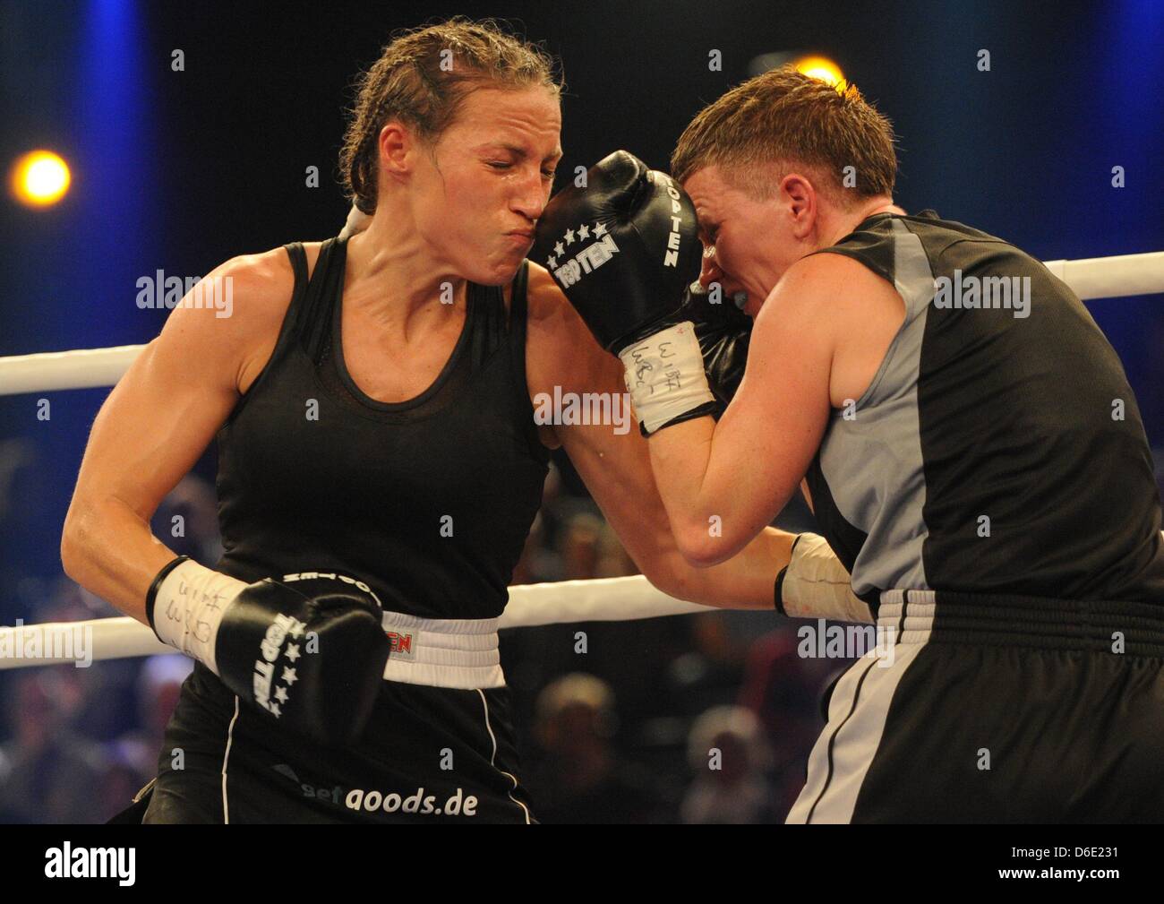 German boxing professional Ramona Kuehne (L) fights against Hungarian