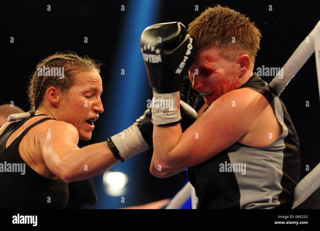 German boxing professional Ramona Kuehne (L) fights against Hungarian