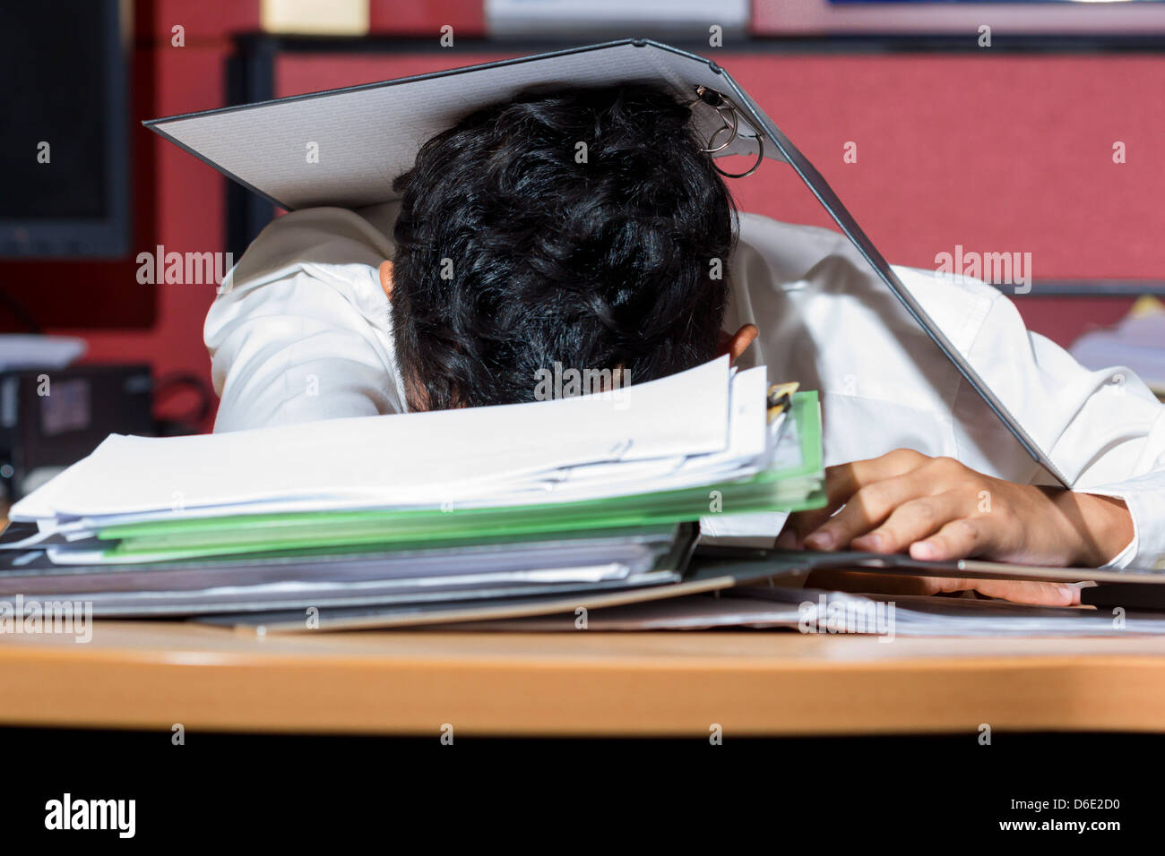 Businessman sleep during working Stock Photo