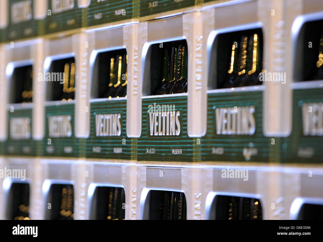 Veltins beer crates are piled in Duesseldorf, Germany, 17 January 2012. The private brewery Veltins presented its figures of the last financial year. Photo: FEDERICO GAMBARINI Stock Photo