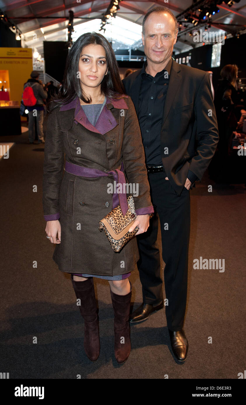 Megha Mittal (l), Chairman and Managing Director of the German fashion  luxury brand Escada, and Escada boss Bruno Sälzer attends the Escada Sport  show during the Mercedes-Benz Fashion Week in Berlin, Germany,