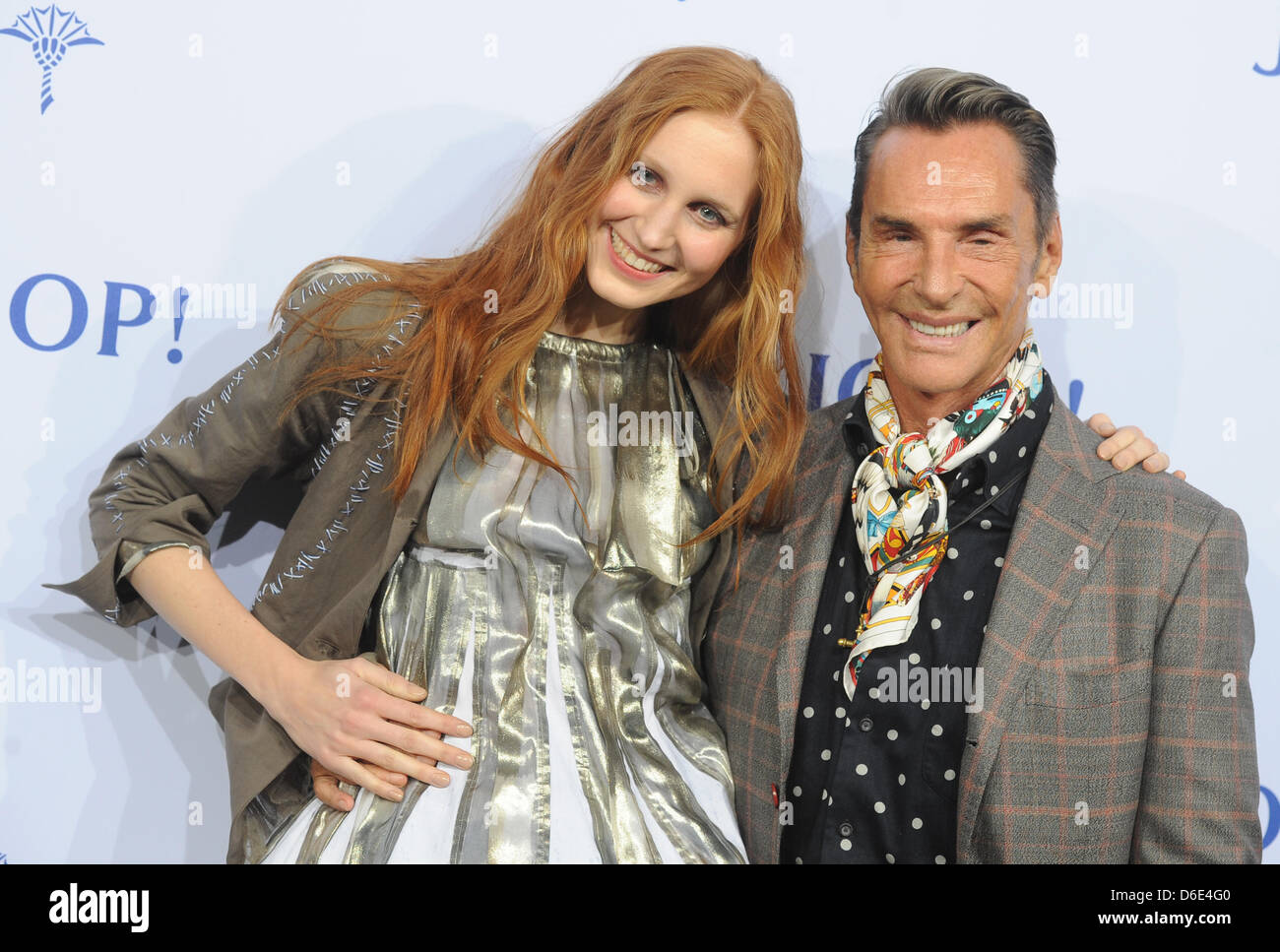 Designer Wolfgang Joop and model Sara Sperling arrive at the Joop  presentation during Fashion Week in Berlin, Germany, 18 January 2012. The  presentation of the Autumn/Winter 2012/2013 collections takes place from 18