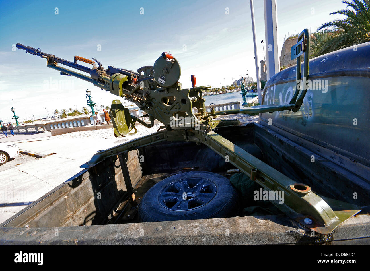 A Russian automatic 14.5 mm caliber gun is mounted to the back of a pick-up on a street in Tripoli, Libya, 17 December 2011. Numerous weapons and cannons mounted on the back of pick-ups and small trucks were used by Libyan rebels as makeshift armoured mobile units in the fight against the Gaddafi regime during the Libyan civil war in 2011. Photo: Matthias Toedt Stock Photo