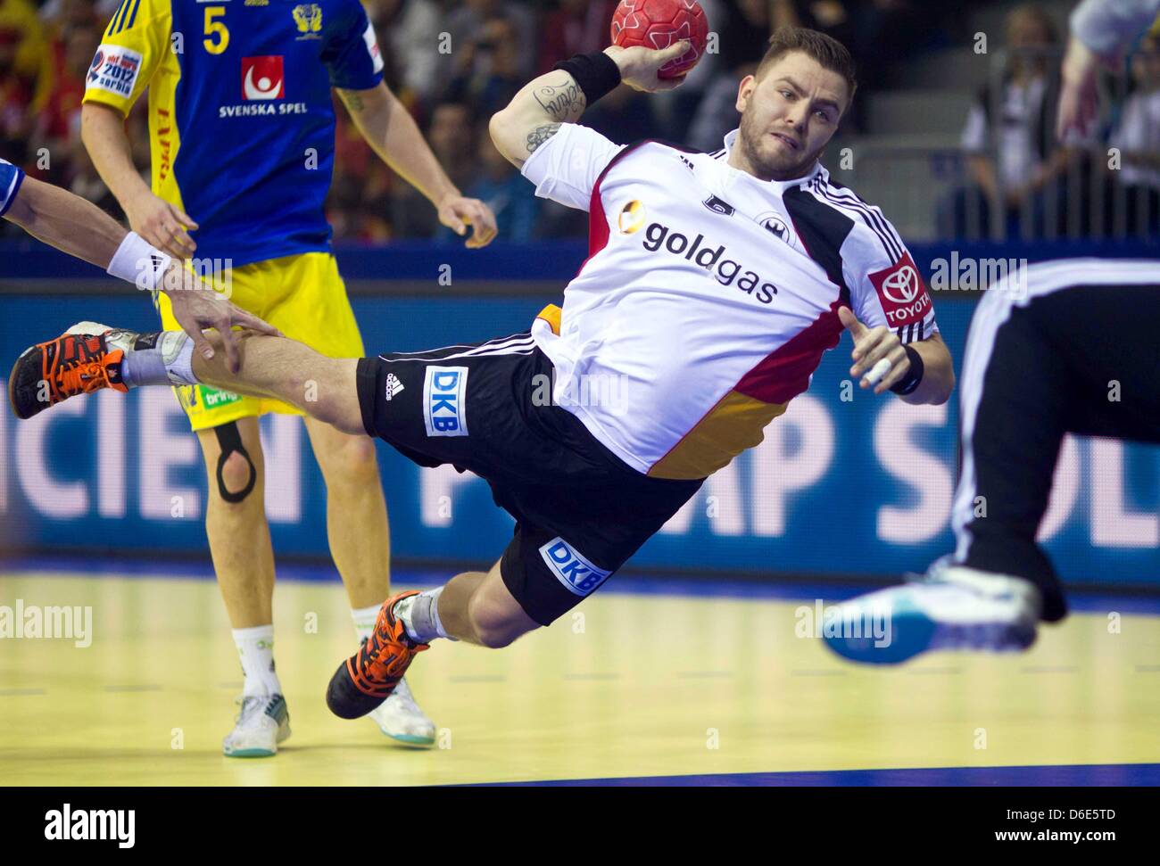 Germany's Christoph Theuerkauf attempts a jump shot during the Handball  European Championship group B match between Germany and Sweden in Nis, Serbia, 19 January 2012. Photo: Jens Wolf Stock Photo