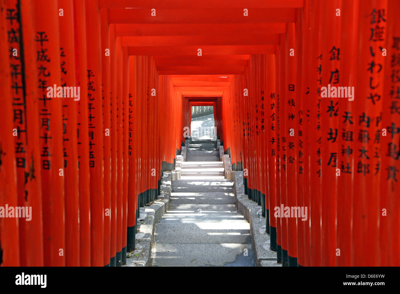 Red Torii gates and steps to the entrance to the Hie-Jinja Shinto Shrine in Tokyo, Japan Stock Photo