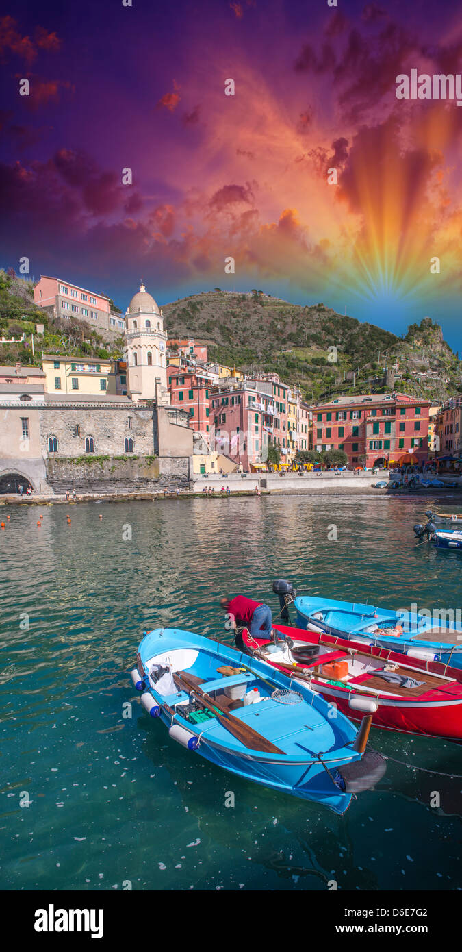 Colorful boats in the quaint port of Vernazza, Cinque Terre - Italy. Stock Photo