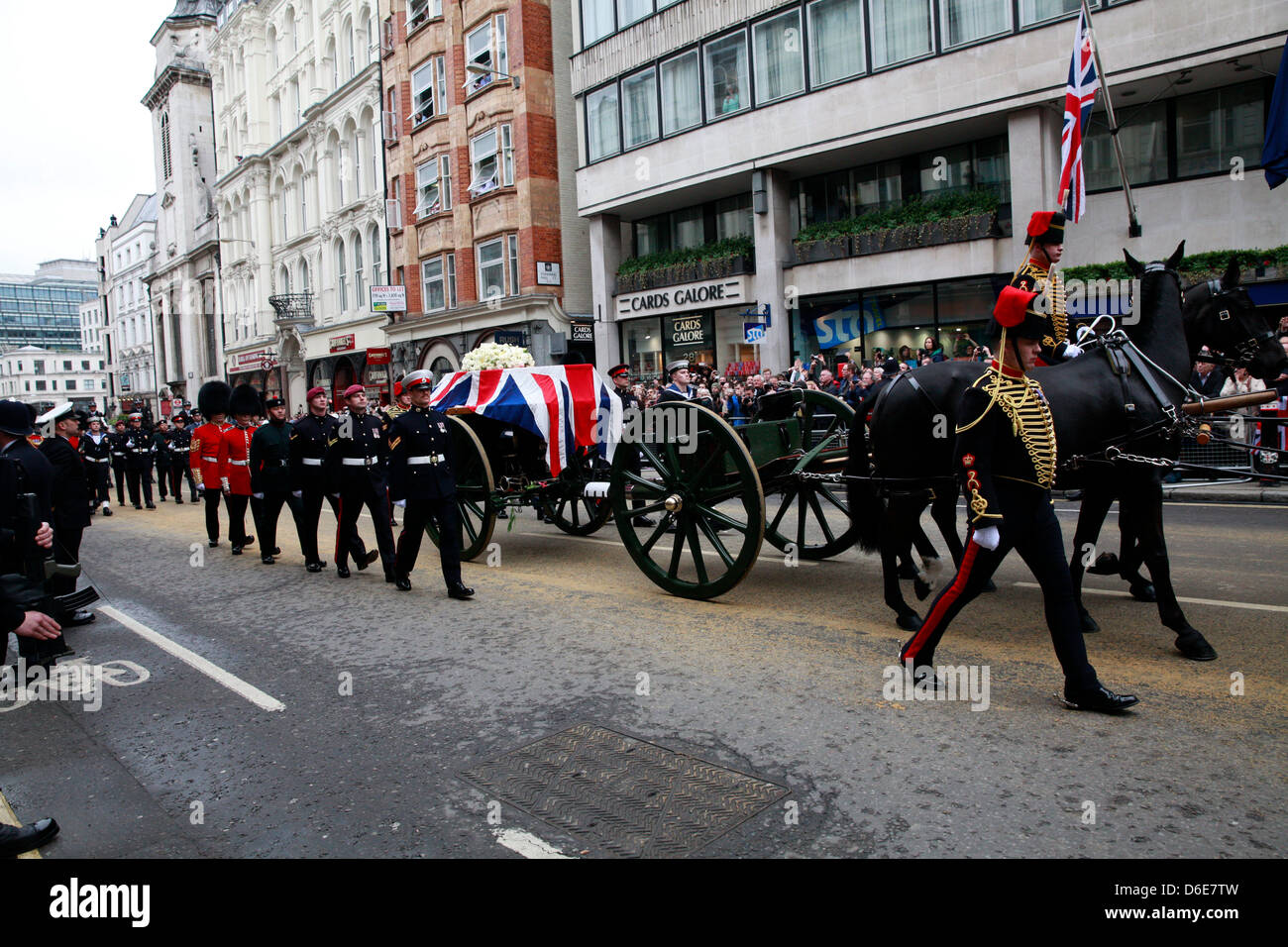 LONDON 17th of April 2013, The funeral of former prime minister Margaret Thatcher was held at St. Paul's Cathedral this morning. Coffin of Margaret Thatcher arriving at St. Paul's Cathedral on a gun carriage drawn by the King's Troop Royal Horse Artillery moving on Ludgate Hill. Stock Photo