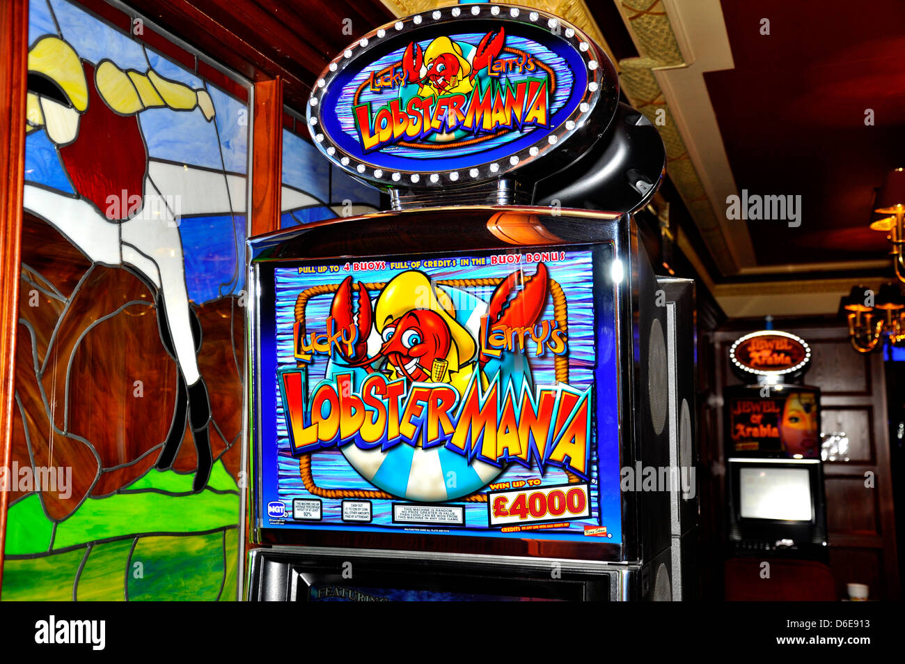 slot machine casino game arcade lobster mania four thousand pound jackpot english money games gamble fruit Stock Photo