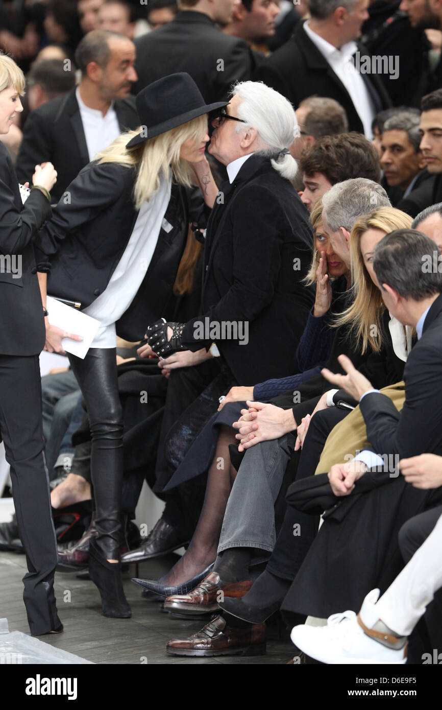 German designer Karl Lagerfeld greets Polish model Anja Rubik prior to the  presentation of Dior Homme fall/winter 2012/2013 collection during the  Paris Men's fashion week, in Paris, France, 21 January 2012. The