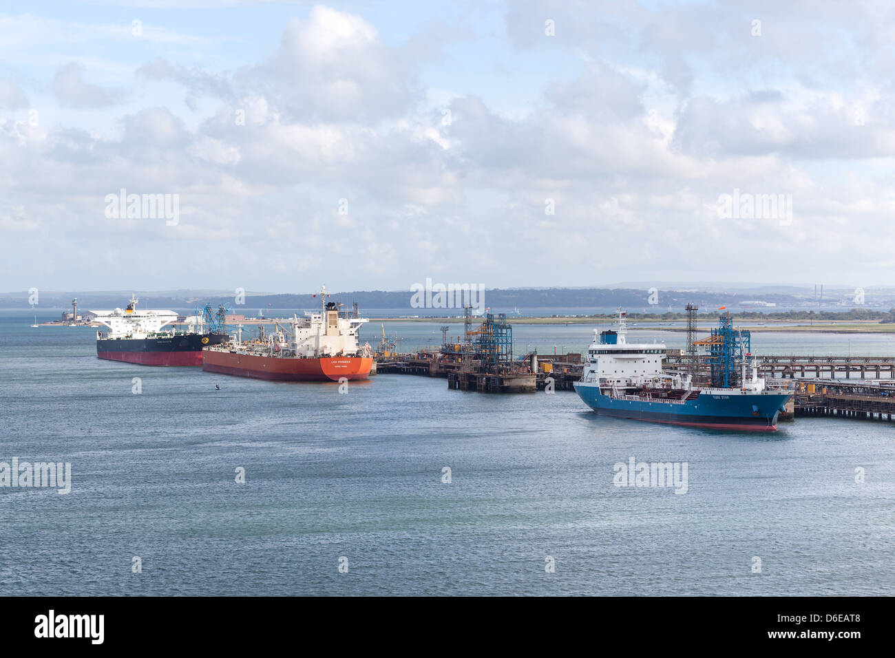 Oil tankers alongside Esso Fawley Oil Refinery Terminal. Solent Stock Photo