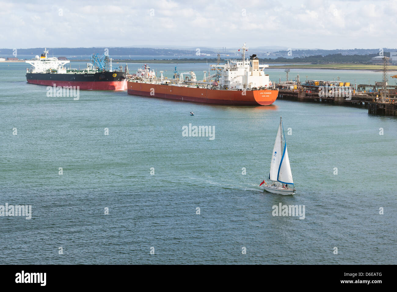 Oil tankers alongside Esso Fawley Oil Refinery Terminal. Solent Stock Photo