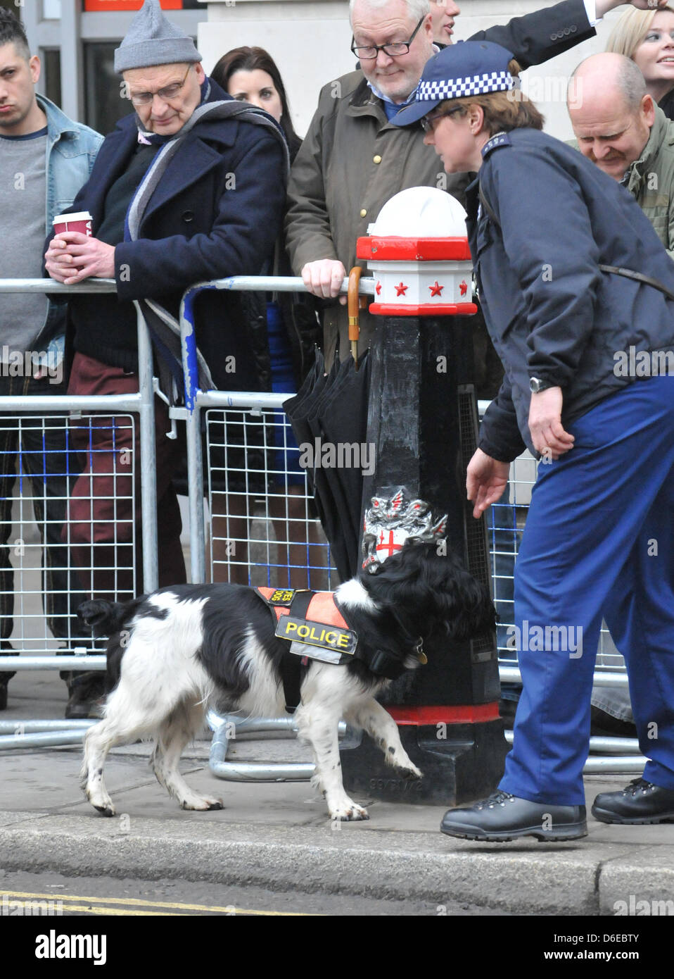 Ludgate Hill, London, UK. 17th April 2013. Sniffer dogs working as part of the high security operation. The funeral procession of Baroness thatcher takes place along the streets of central London. Credit: Matthew Chattle/Alamy Live News Stock Photo