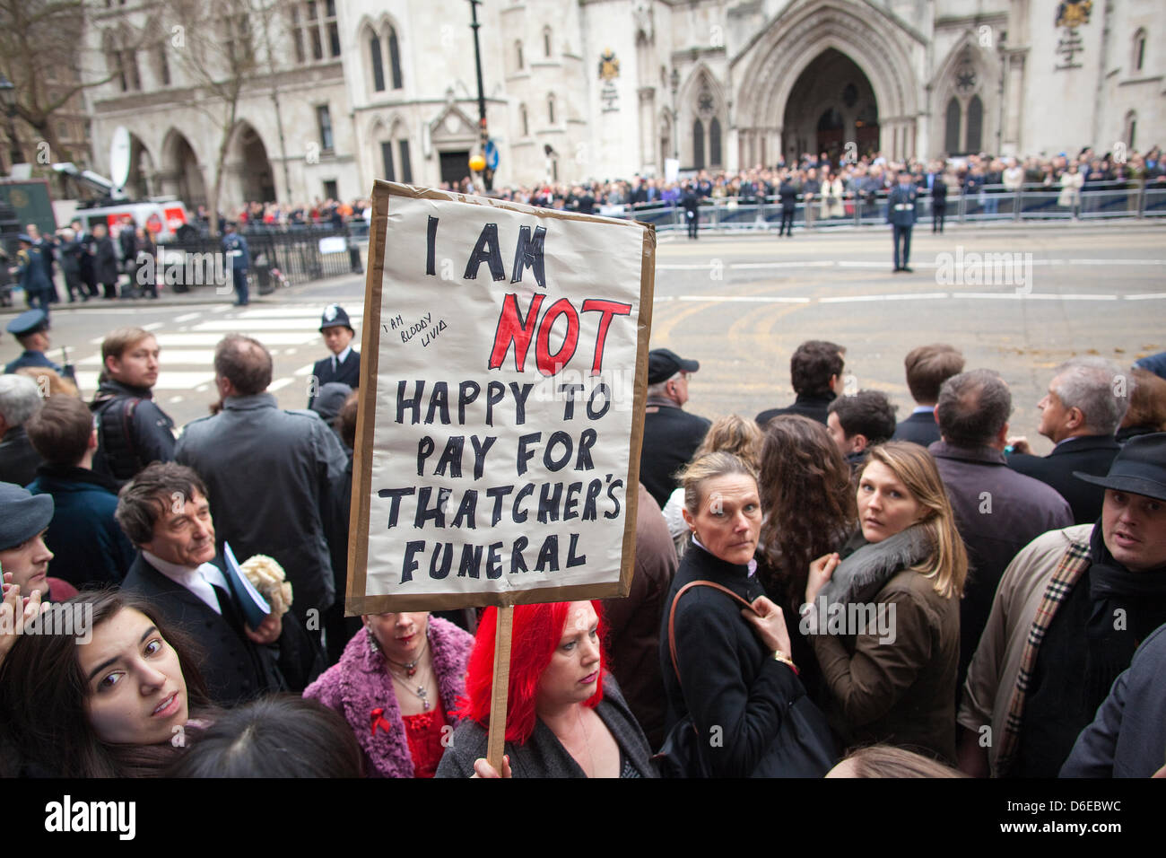 London, UK. 17th April 2013. The Ceremonial Funeral of Former British Prime Minister Baroness Thatcher. Protesters amongst the crowds on the route of the Ceremonial Funeral of Baroness Thatcher pass along Fleet Street, London, UK. Credit: Jeff Gilbert/Alamy Live News Stock Photo