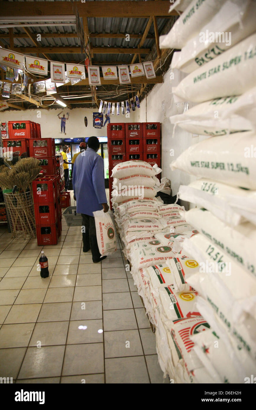 12.5Kg bags of maize meal for sale in a general dealer shop Stock Photo