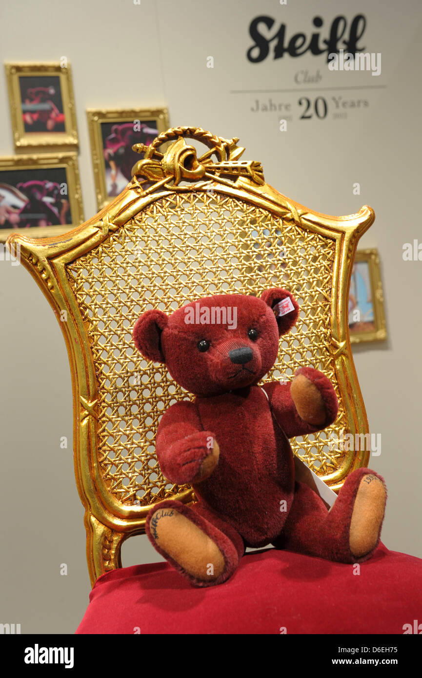 Teddy bear Louis, Steiff Club Edition 2012, sits in a golden chair at the  stand of the stuffed animal maker at the 63rd International Toy Fair in  Nuremberg, Germany, 01 February 2012. At the world's largest toy trade  fair, 2,800 exhibitors from 62 coun