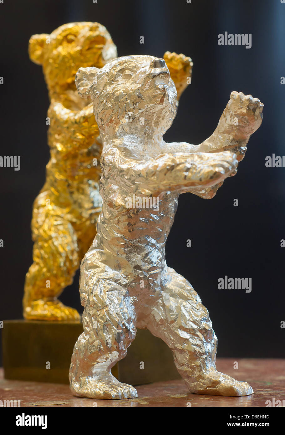 A silver and a golden Bear, the awards of the Berlinale, are pictured in a workshop of the sculpture foundry Hermann Noack in Berlin, Germany, 02 February 2012. The 62nd Berlin International Film Festival will take place from 09 till 19 February 2012 during which the silver and golden bears will be awarded. Photo: TIM BRAKEMEIER Stock Photo