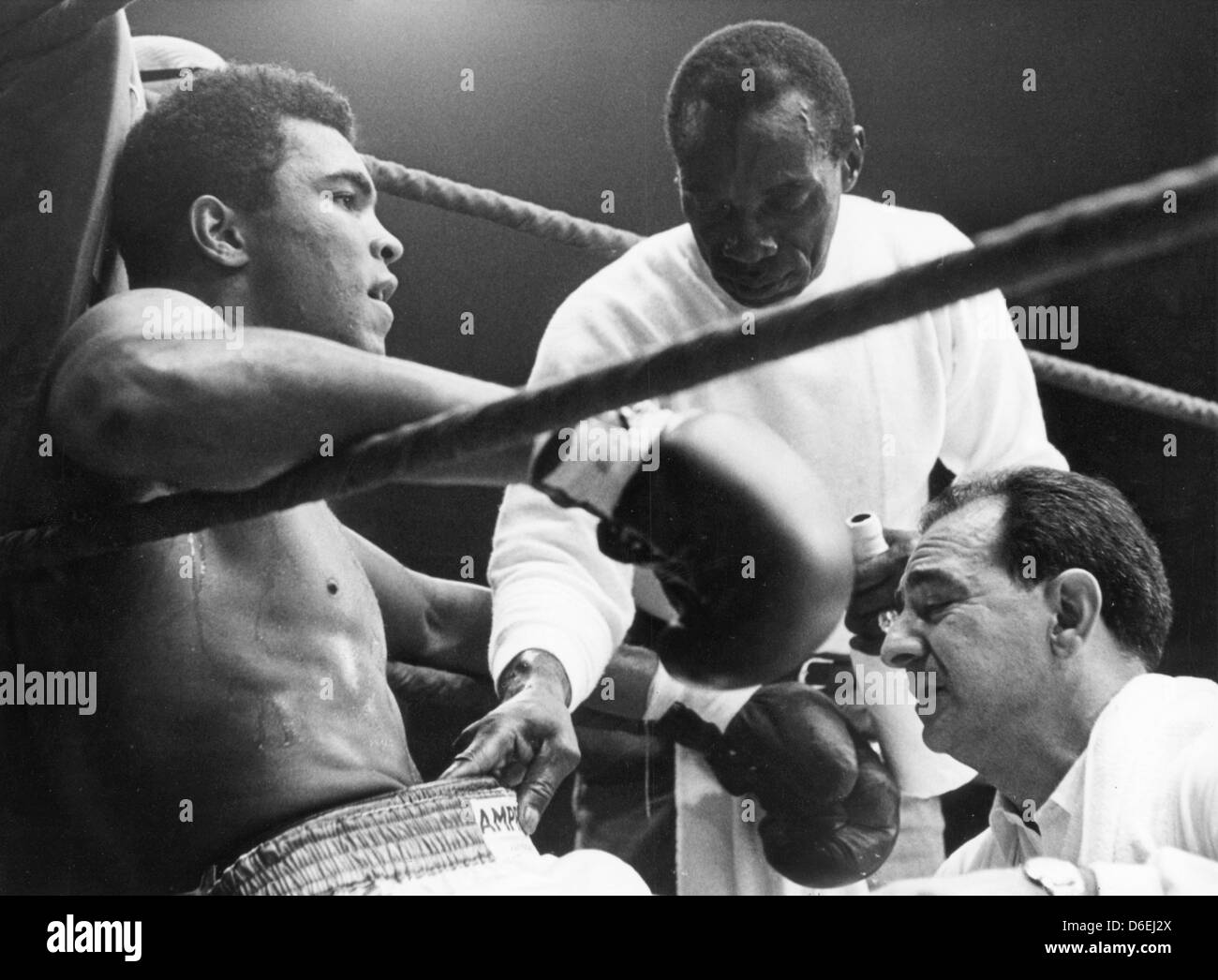 FILE - An archive picture dated 10 September 1966 shows heavyweight boxing  world champion Muhammad Ali aka Cassius Clay (L) during a break being cared  for by his trainer Angelo Dundee (R)