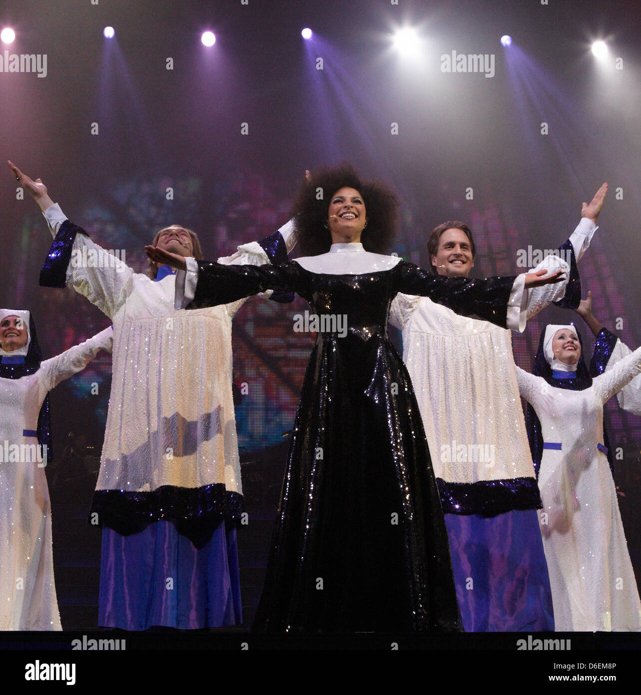 Musical singer Patricia Meeden (front) and ensemble perform 'Sister Act' during the 'Best of Musical Gala 2012' at the O2 World in Hamburg, Germany, 04 February 2012. After its premiere the show will tour twelve further cities in Germany presenting musical classics and latest hits. Photo: Georg Wendt Stock Photo