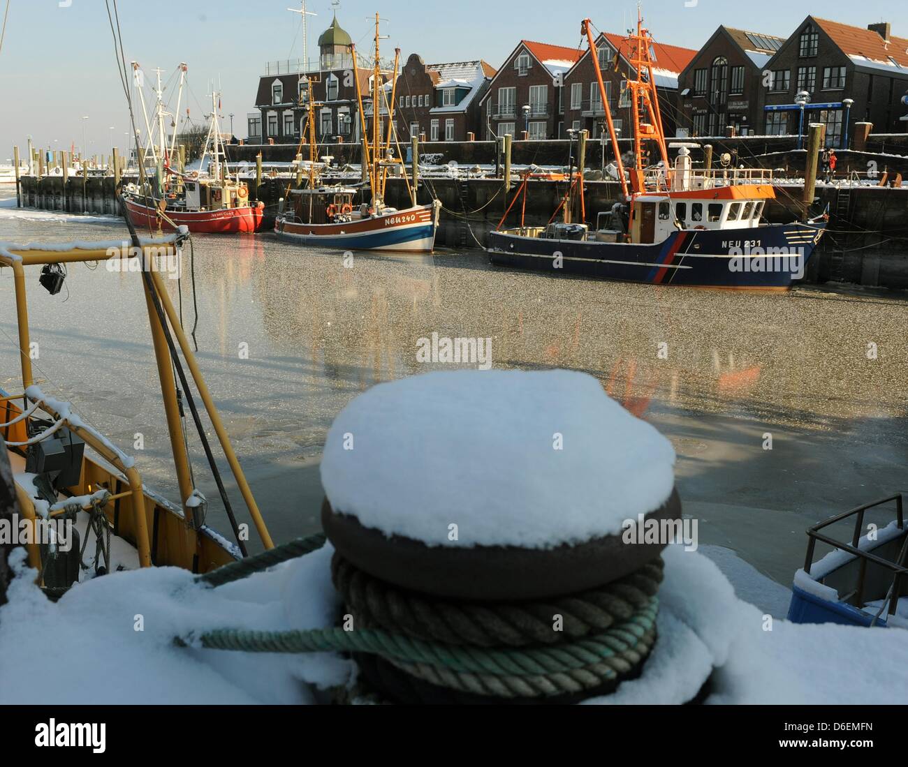 A crab cutters are frozen in the port of Neuharlingersiel, Germany, 05 February 2012. The weather is frosty in Germany and currently affects the waterway transport. Photo: INGO WAGNER Stock Photo