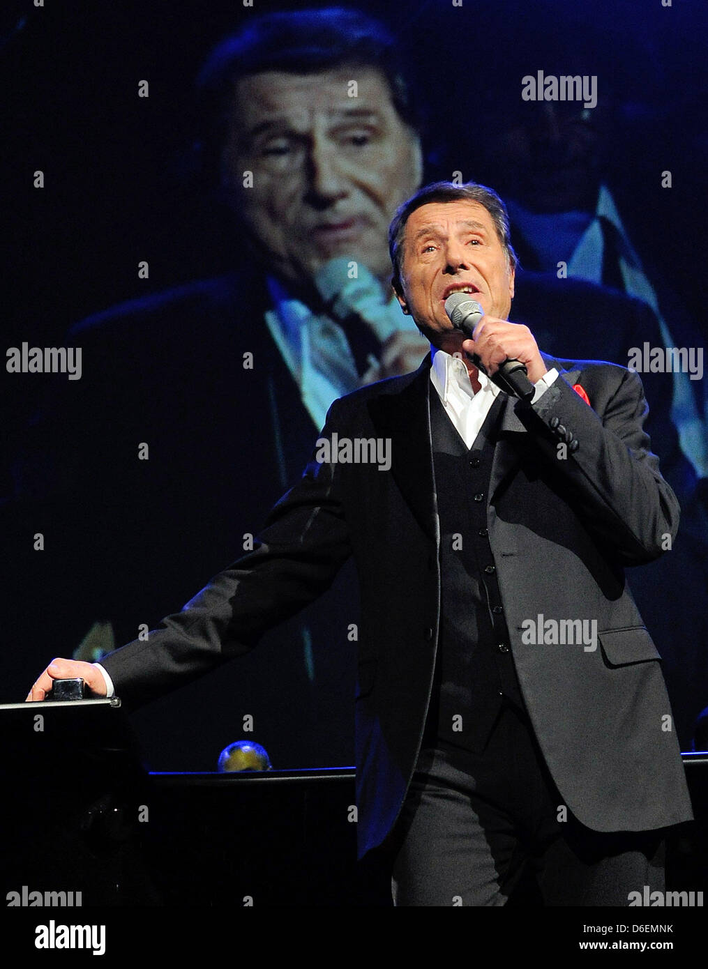 German singer Udo Juergens performs on stage during his tour 'Der ganz normale Wahnsinn' in