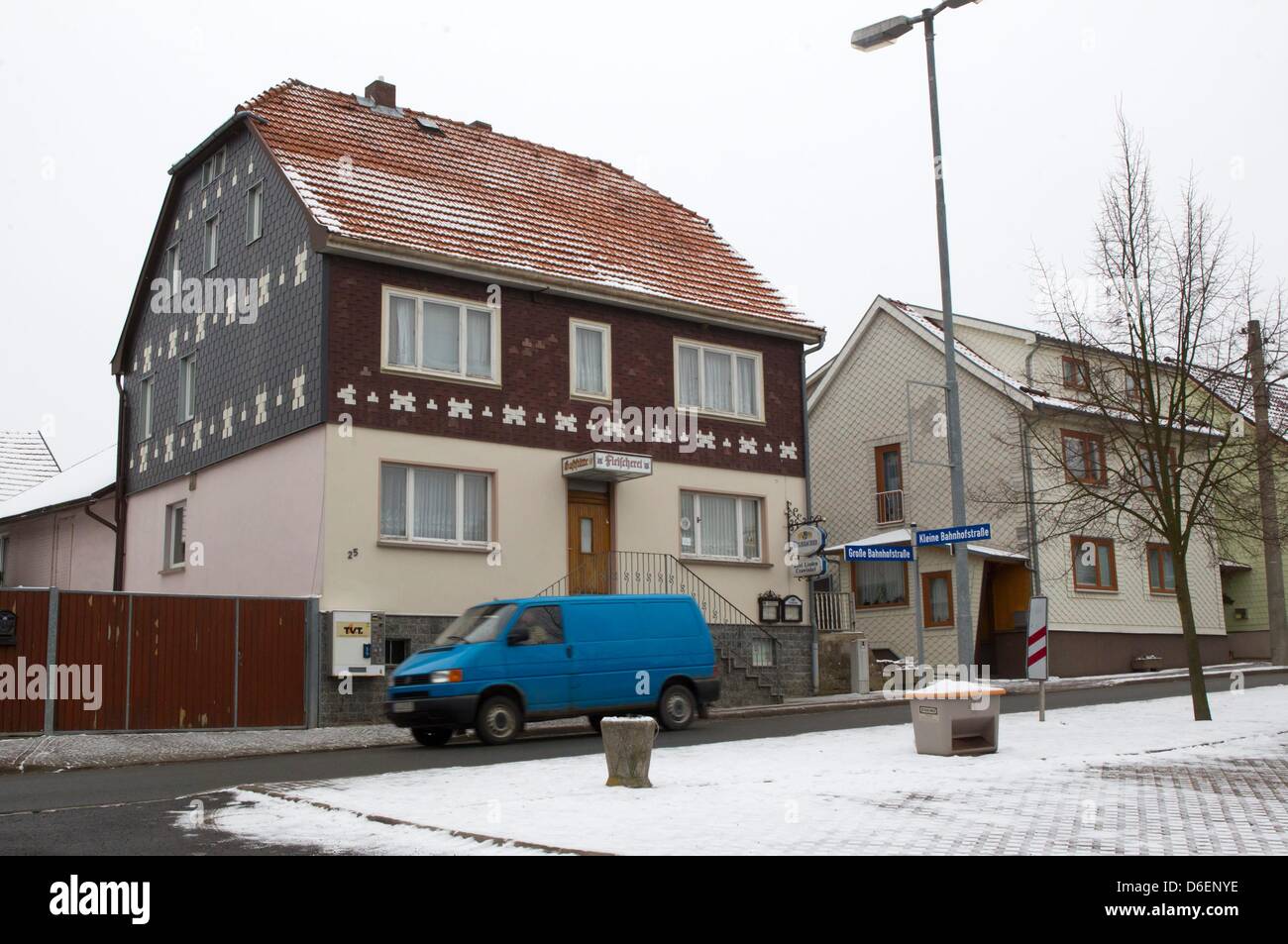 A car drives past the pub 'Drei Linden' in Crawinkel, Germany, 07 February 2012. The police prevented a concert of far-right musicians here on Saturday. According to the government in Thuringia, a new far-right scene meeting could start here. Photo: Michael Reichel Stock Photo