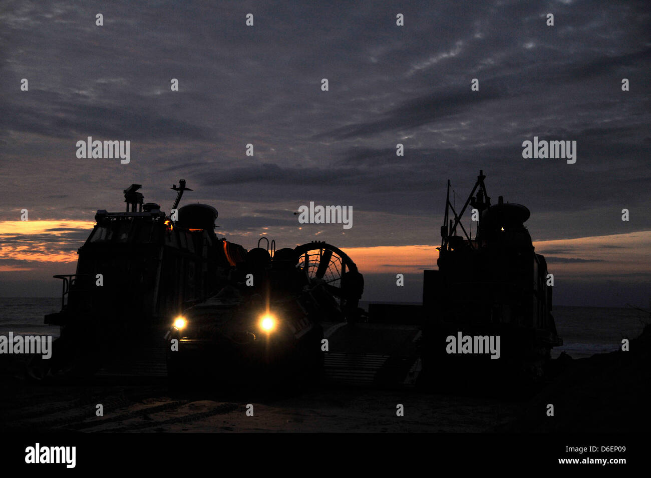An amphibious assault vehicle is offloaded from a landing craft, air cushion (LCAC) Monday, February 6, 2012 during a Bold Alligator 2012 amphibious landing exercise at Camp Lejeune, North Carolina. Bold Alligator 2012, the largest naval amphibious exercise in the past 10 years, represents the Navy and Marine Corps' revitalization of the full range of amphibious operations. The exe Stock Photo