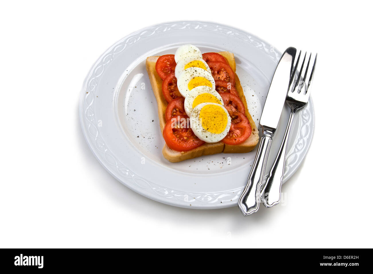 Sliced boiled egg and tomato toast Stock Photo Alamy