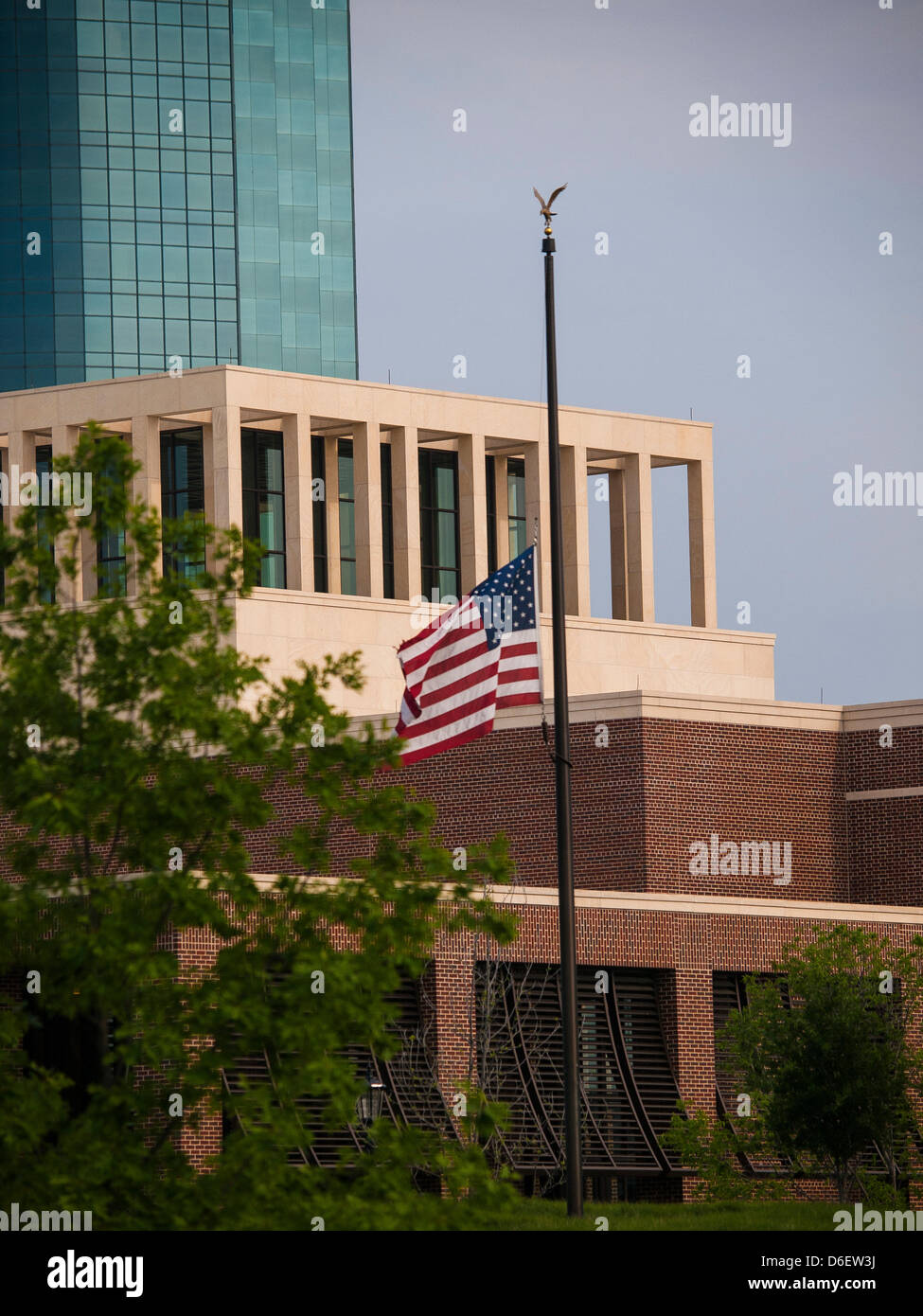 Flag outside the George W Bush Presidential Library flies at half mass after the Boston marathon bombing. Library will be dedicated on April 25 and open to the public on May 1st Stock Photo