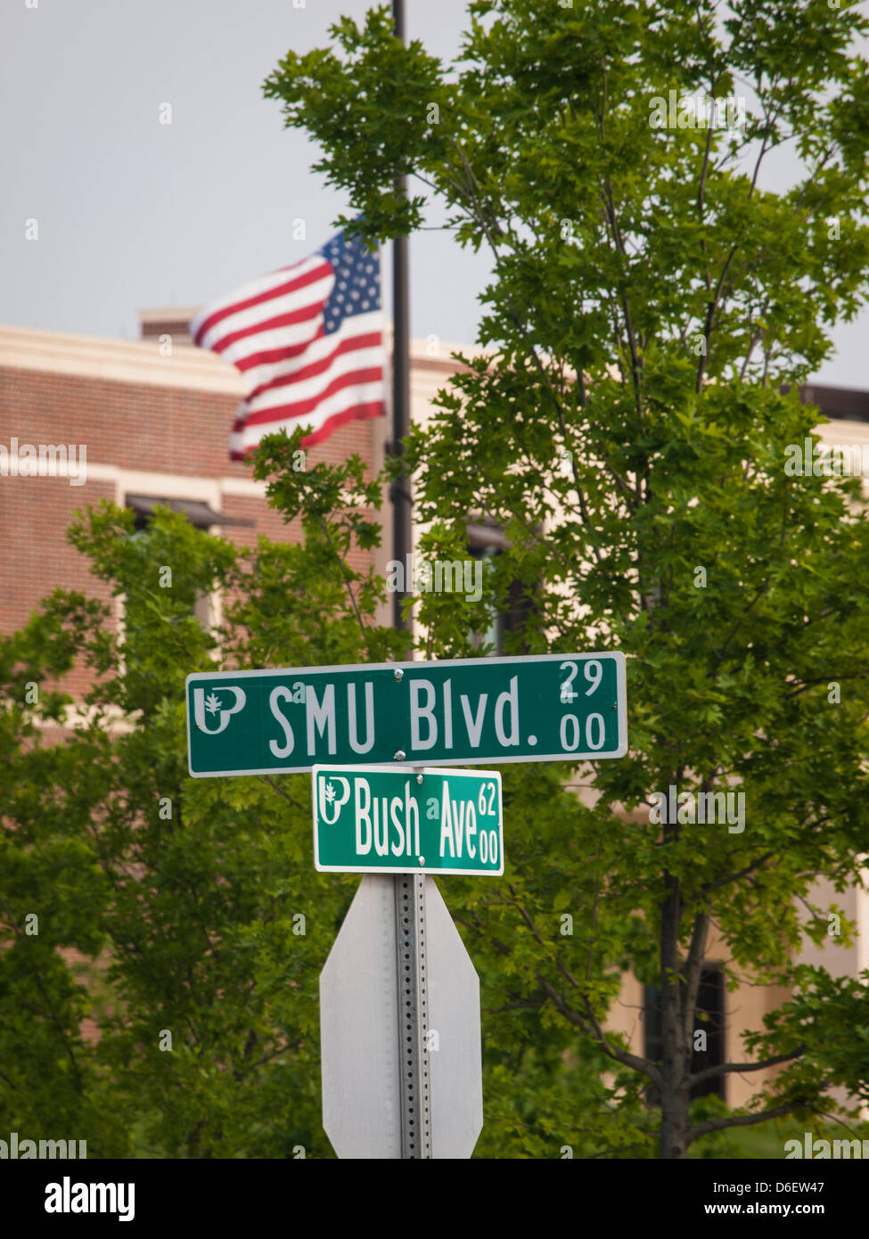 At the intersection of SMU and Bush, the flag outside the George W Bush Presidential Library on the campus of Southern Methodist University features replica of White House oval office along with memories of 911 and entering into war. Stock Photo