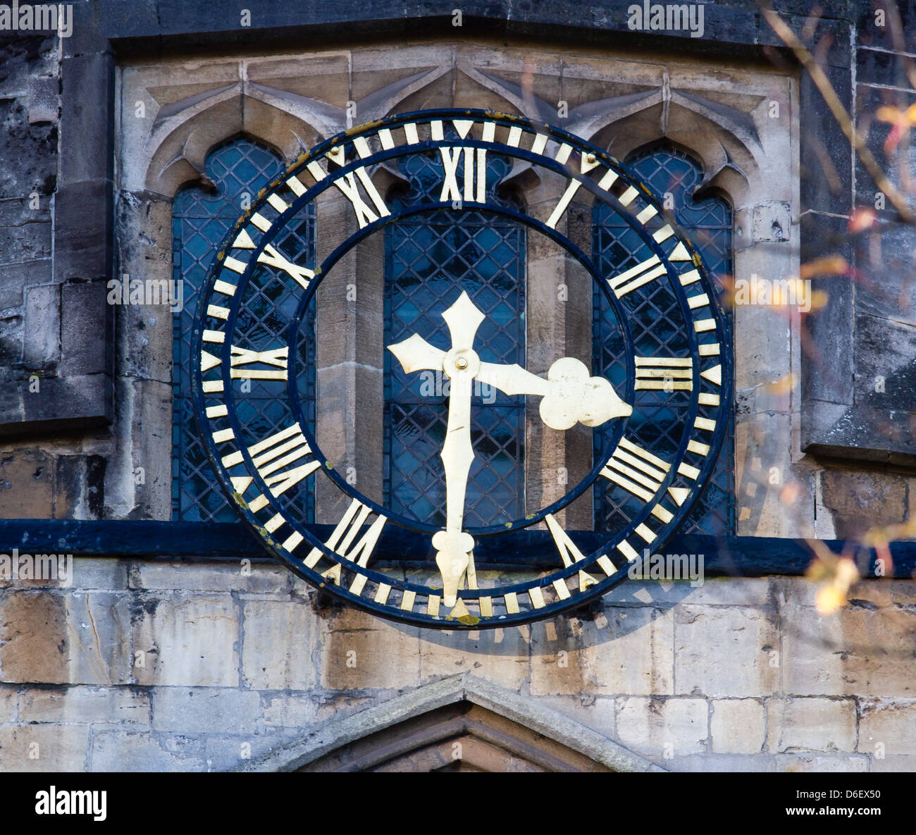 Clock with Roman numerals on the entrance tower to Bristol Cathedral ...