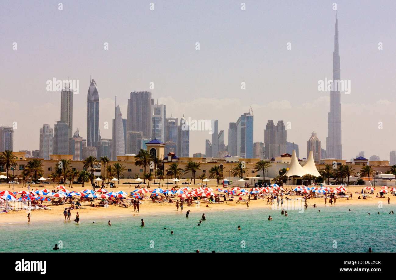 Skyline of Dubai above Jumeirah Public Beach, with Burj Al Khalifa in the background, Dubai, United Arab Emirates Stock Photo
