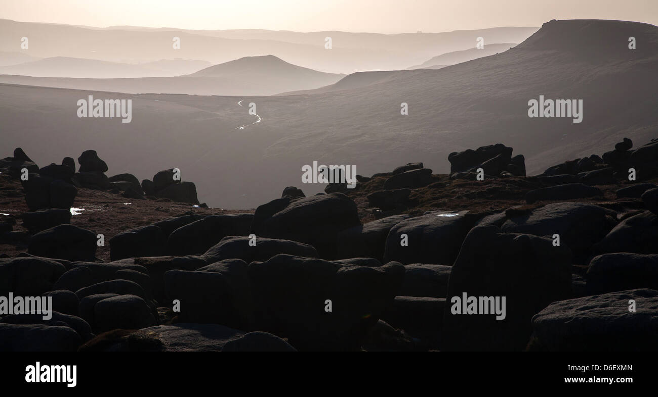 The Wool Packs on the edge of Kinder Scout in the Derbyshire Peak District at sunset looking towards Swine's Back Stock Photo