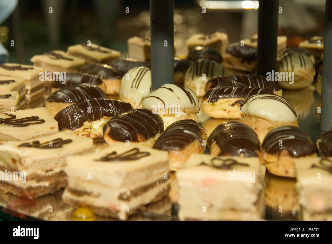 mini cakes and pastries on the dessert buffet of a cruise ship Stock