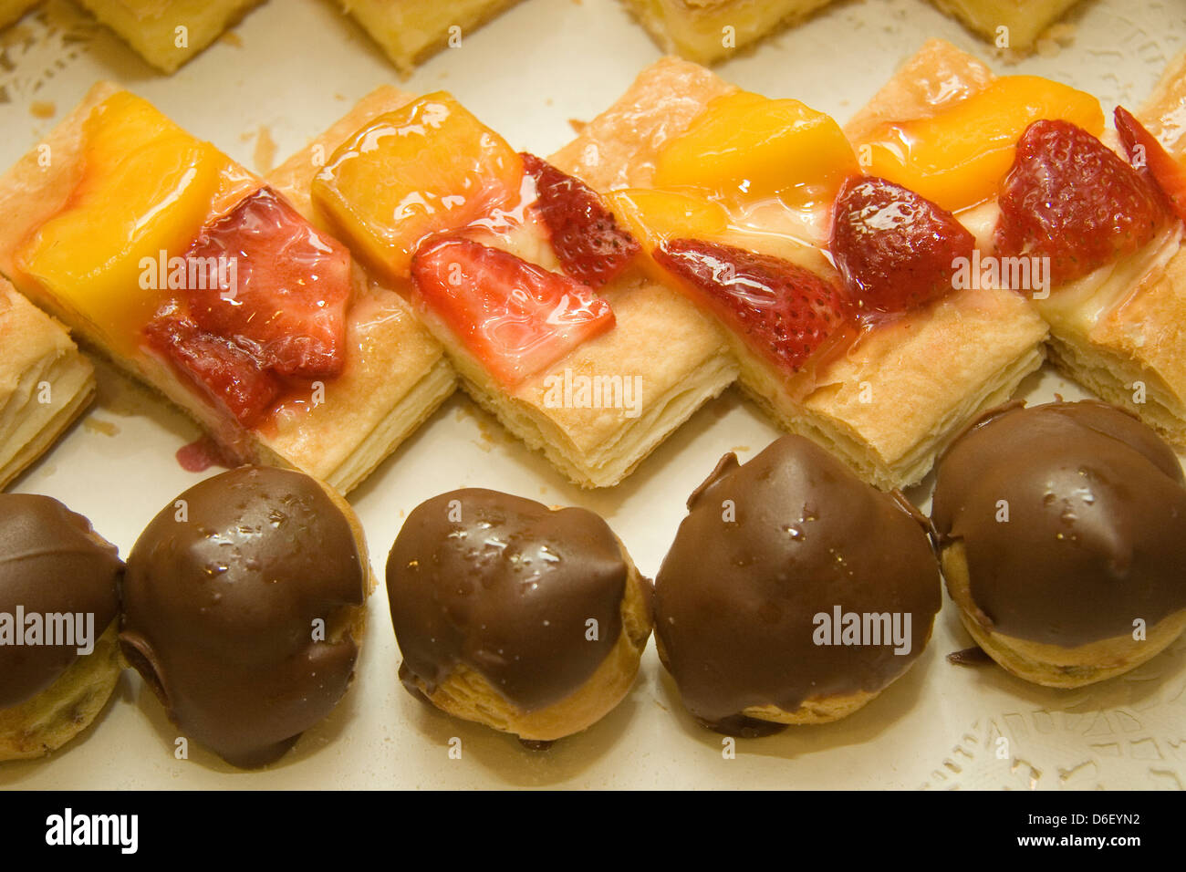 mini cakes on the midnight dessert buffet of a cruise ship Stock Photo