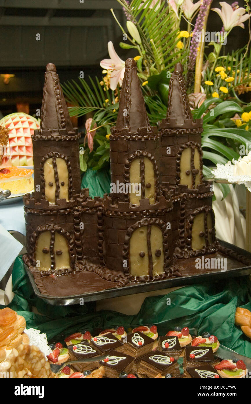 chocolate castle sculpture on the dessert buffet of a cruise ship Stock