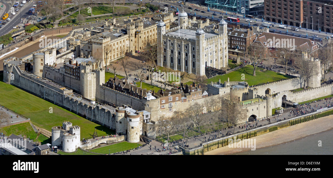 Aerial birds eye view from above looking down on historical Tower of London & White Tower a UNESCO World Heritage Site & Grade I Listed Building UK Stock Photo