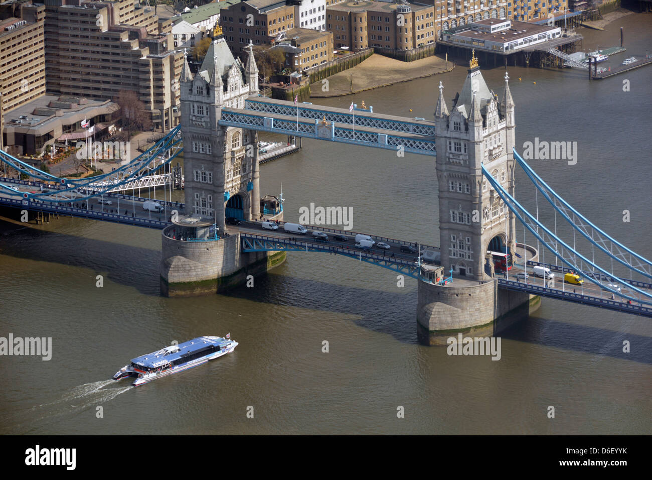 Aerial view from top of the Shard famous Tower Bridge & River Thames  high speed Thames clipper public transport at Pool of London England UK Stock Photo