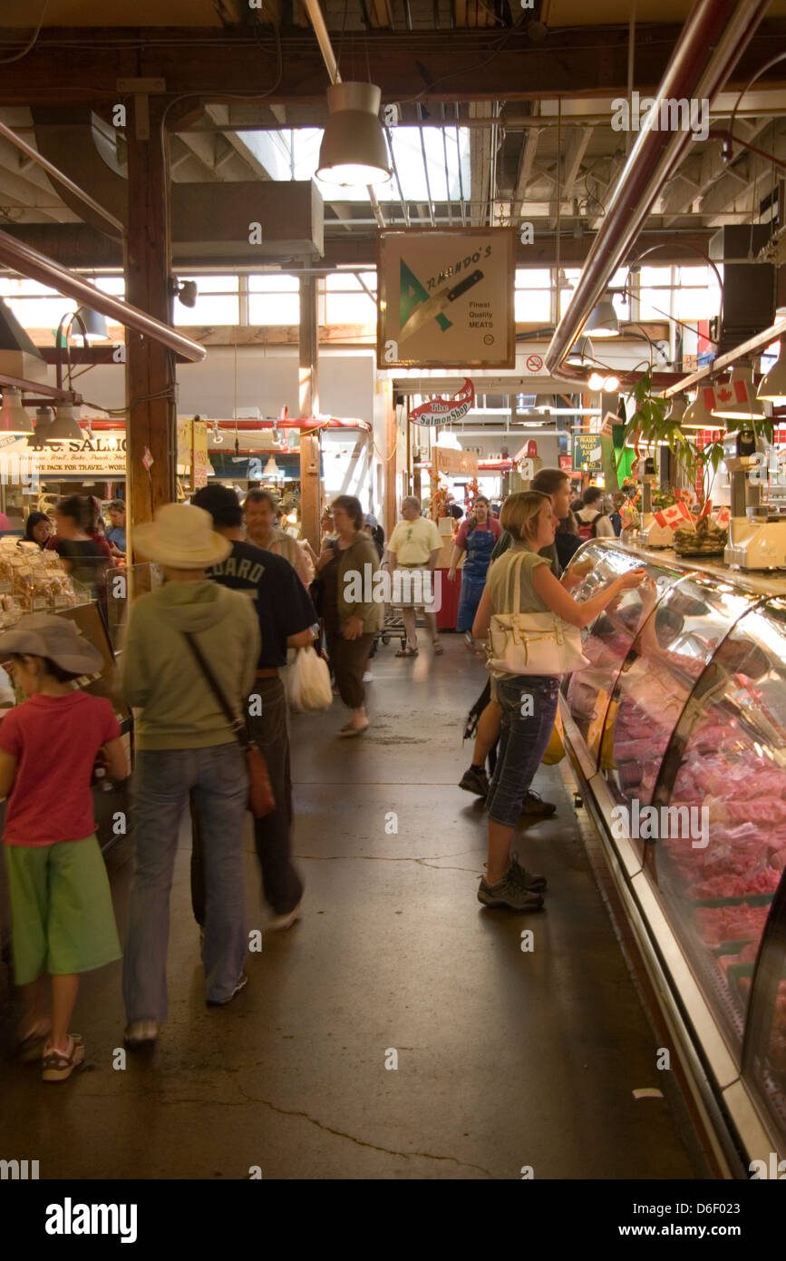 Shoppers at Granville Island Market in Vancouver, BC, Canada Stock Photo