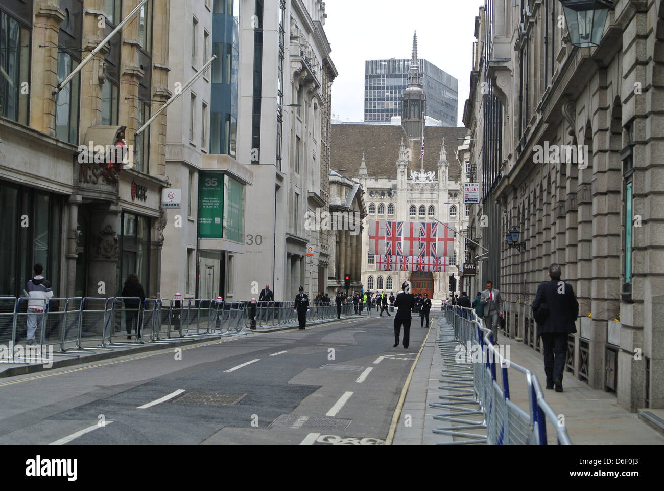 Empty roads, no traffic. Day of Margaret Thatchers funeral. London. English flags, British Flags, policeman. Barriers. Stock Photo