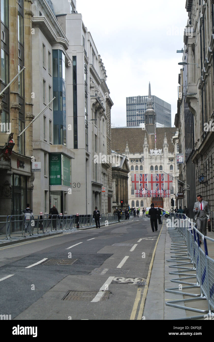 Empty roads, no traffic. Day of Margaret Thatchers funeral. London. English flags, British Flags, policeman. Barriers. Stock Photo