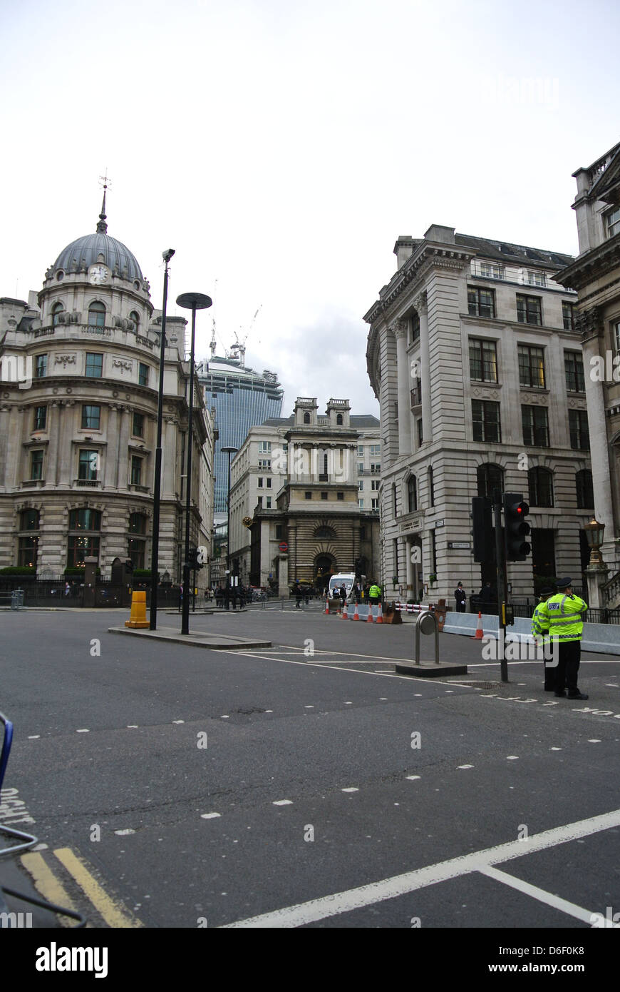 Empty roads, no traffic, cars, buses. Day of Margaret Thatchers funeral. Line of police. London. Bank station. Stock Photo