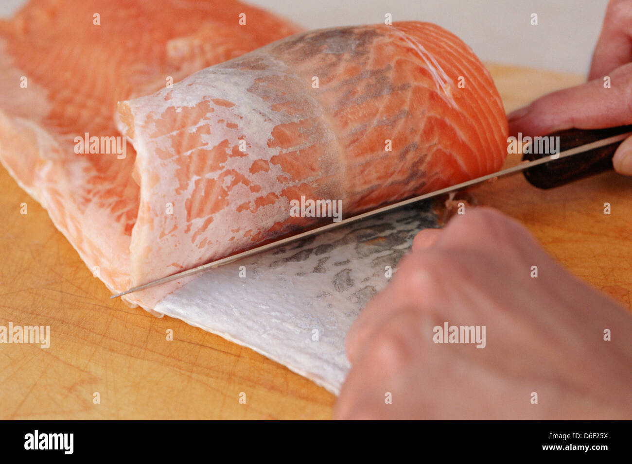 Skinning a Salmon Fillet Stock Photo - Alamy