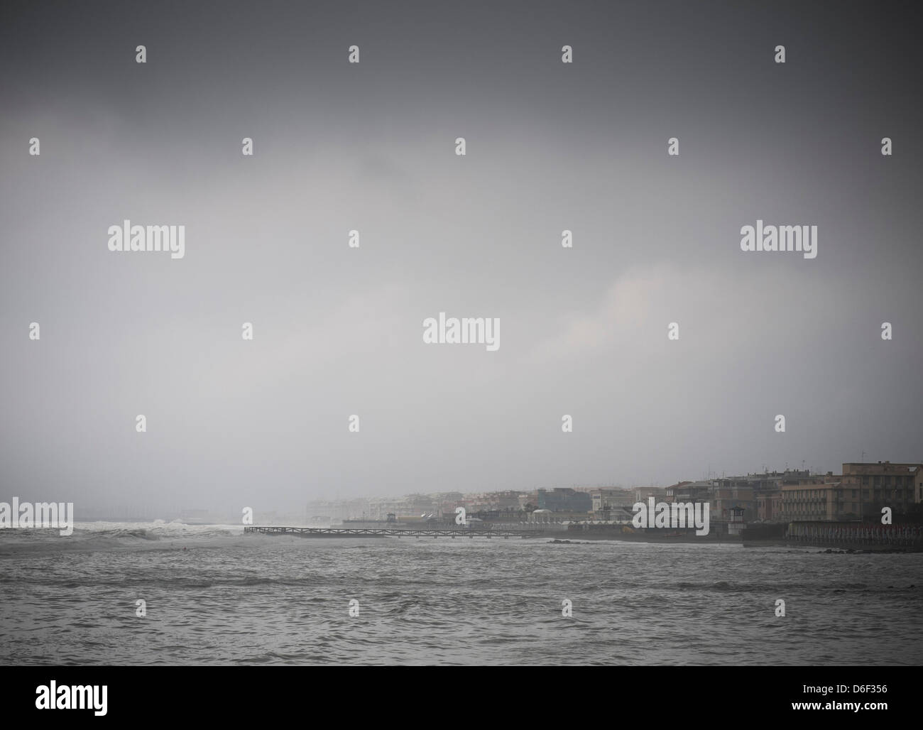 seaside town in winter with a rough sea Stock Photo
